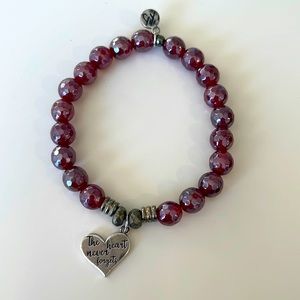 T Jazelle the heart never forgets on ruby red agate